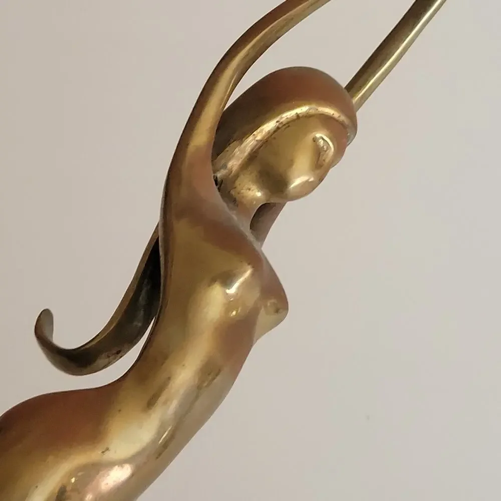 Vintage Mid-Century Modern (MCM) brass sculpture of an elongated female figure